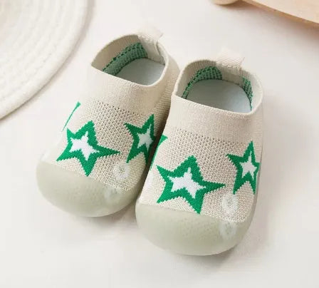Baby soft sole non-slip walking shoes in cream yellow with fly woven cotton upper and natural rubber sole