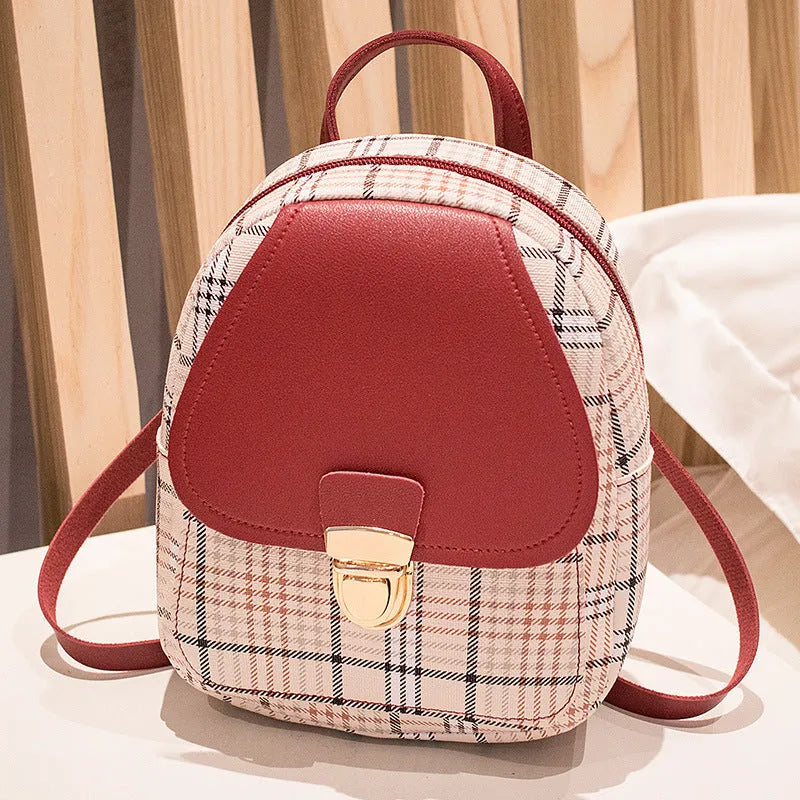 One shoulder diagonal phone bag in PU leather available in black, blue, brown, pink, and red colours.
