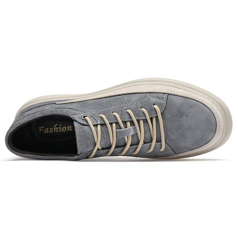 Men's grey casual leather skate shoes with lace-up front and rubber sole