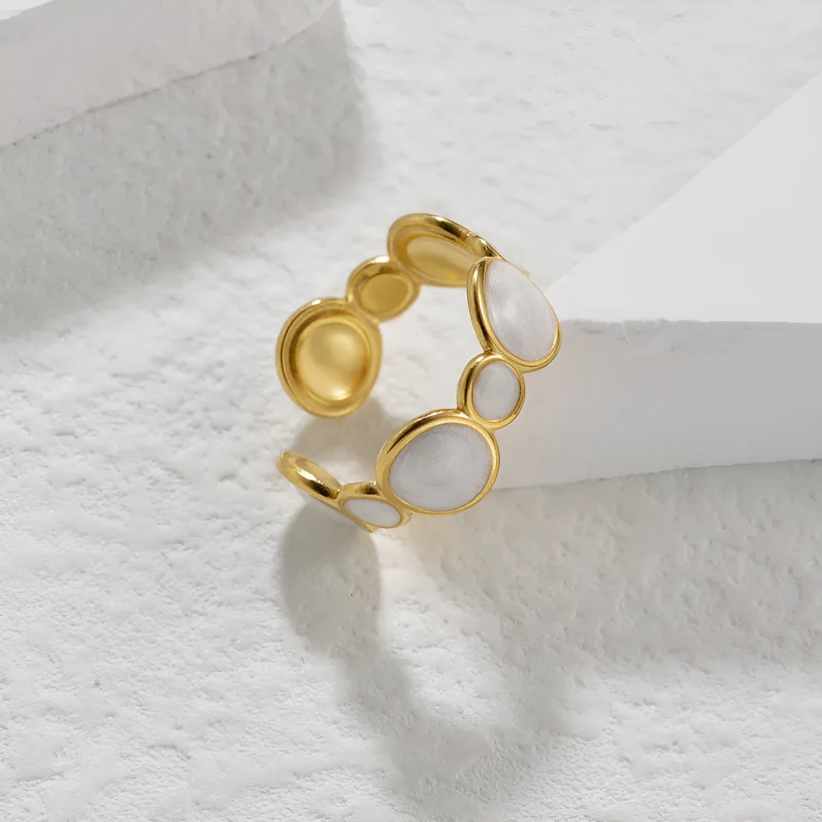 Adjustable opening geometric ring in stainless steel with electroplated finish, contemporary jewellery design