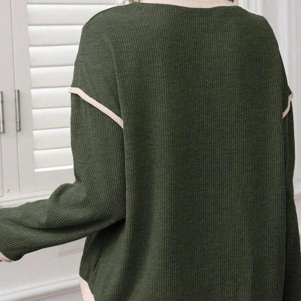 Women's loose knit top with drop shoulders and four leaf clover contrast colour trim