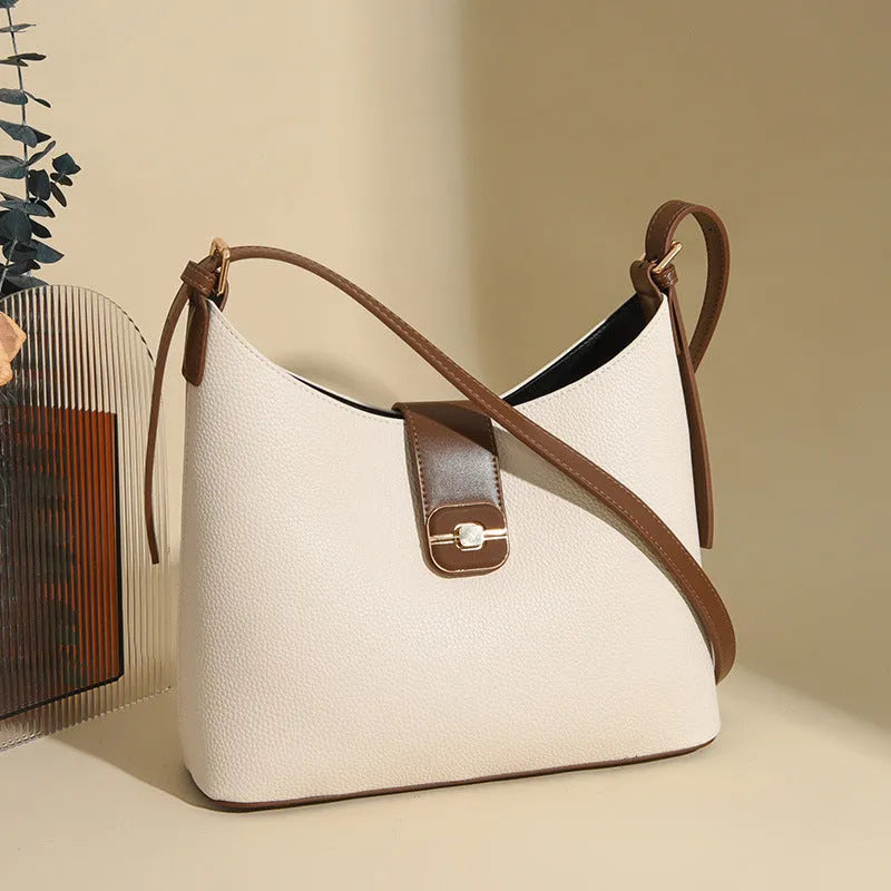 All-matching Simple Large-capacity Bucket Bag in PU material, available in four colours: black, gray, biscuit, milky white