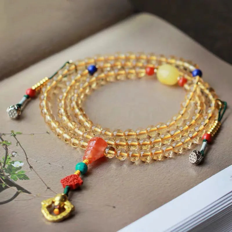 Natural Brazil citrine bracelet with 1mm yellow beads on filament string