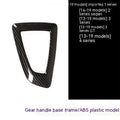 BMW gear base frame in carbon fibre pattern with titanium finish, 13x9cm, left-side fitment