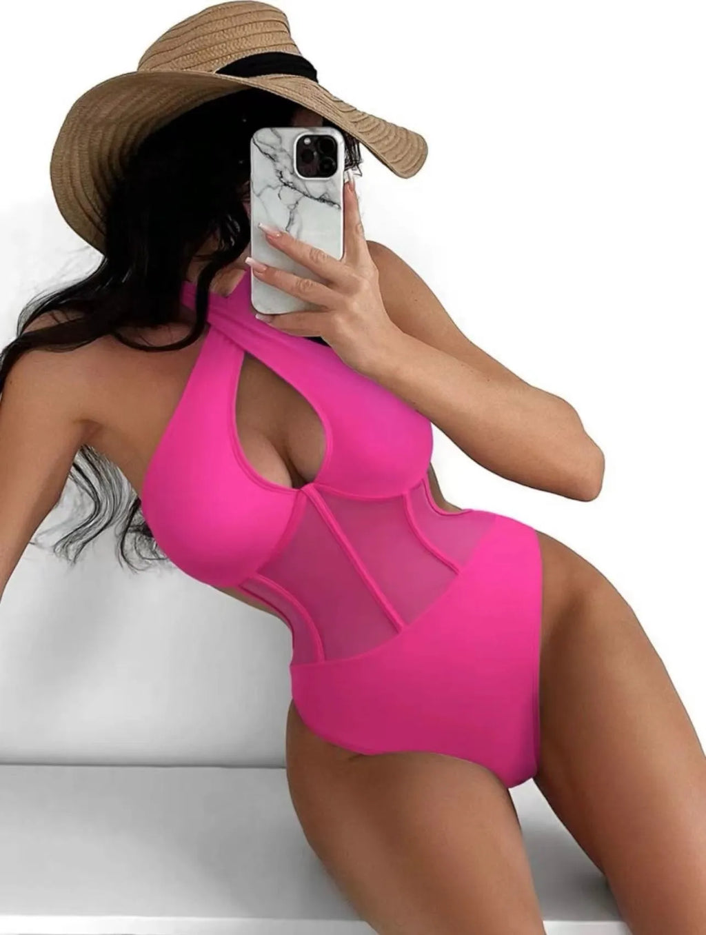 Women's black one-piece swimsuit bikini made from nylon and spandex fabric on a mannequin.