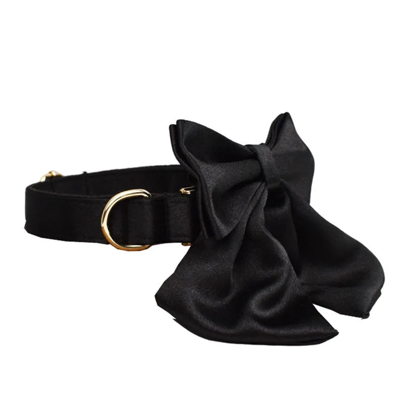 Pet harness set showing cloth collar, leash, decorative bow, and matching vest in four available sizes
