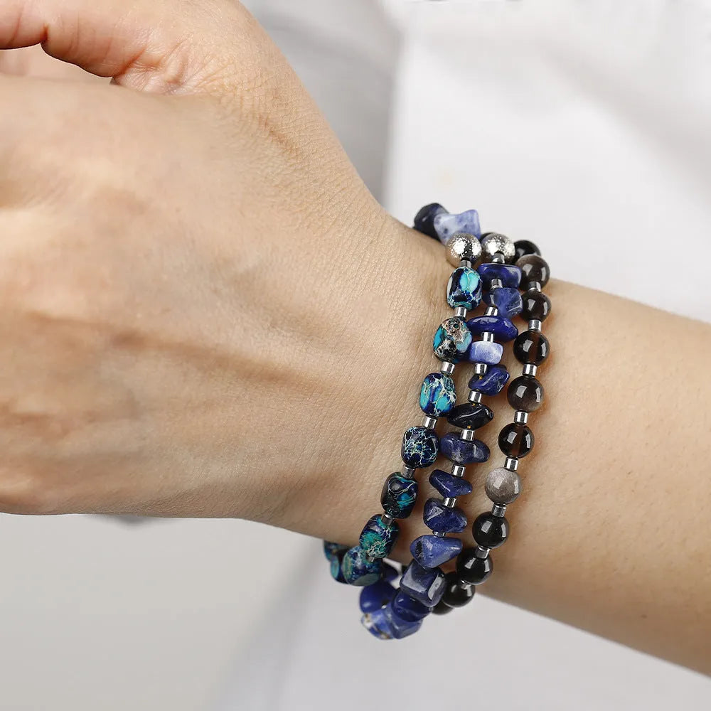 Female retro multi-layer hand woven crushed stone bracelet in blue with Fang Hui stone and gold Obsidian
