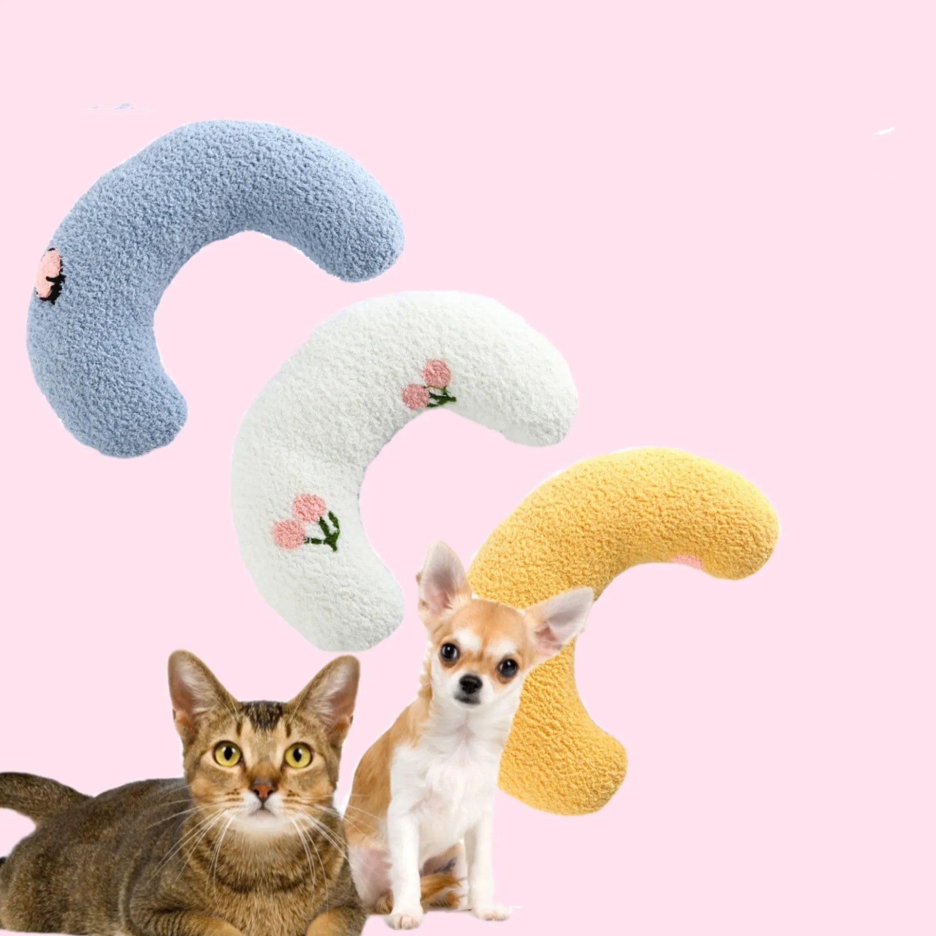 Small half-donut shaped pet pillow in blue faux fur, showing quilted texture and plush filling.