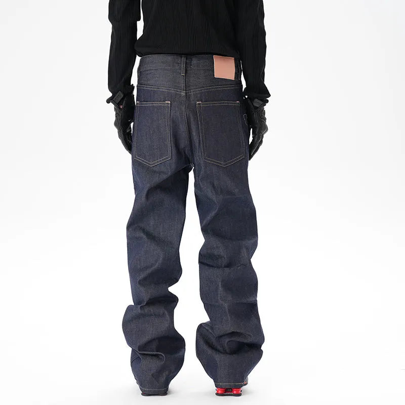 Casual loose straight original jeans in dark blue denim fabric, front view, showing loose straight leg cut.