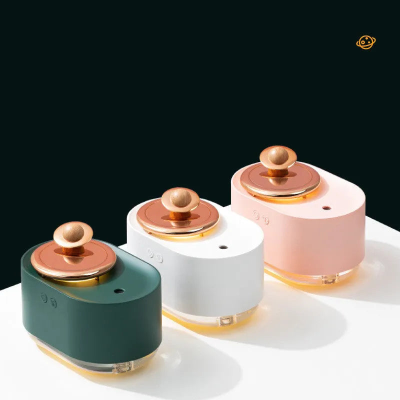 Planet-shaped humidifier with night light in green, pink or white colours for small spaces