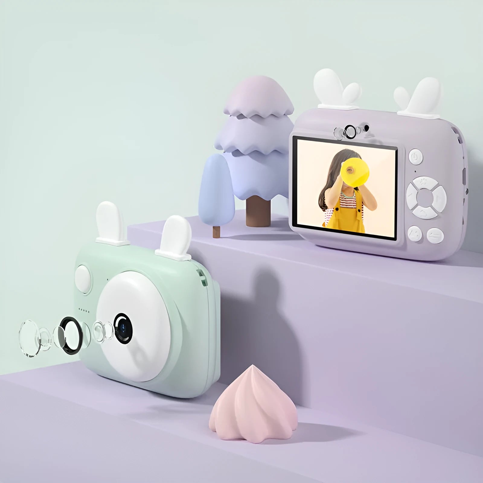 A2 kids digital camera in macaron colours with 2.4-inch screen and dual 40MP cameras on a lanyard.