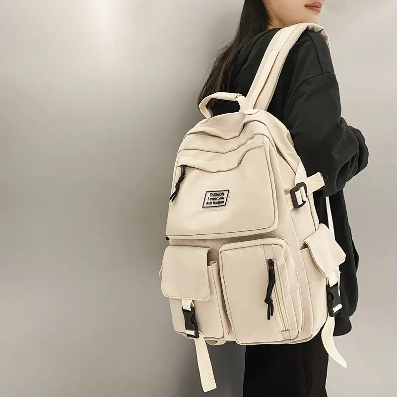 Soft nylon student backpack with computer compartment and three-dimensional pockets in black colour