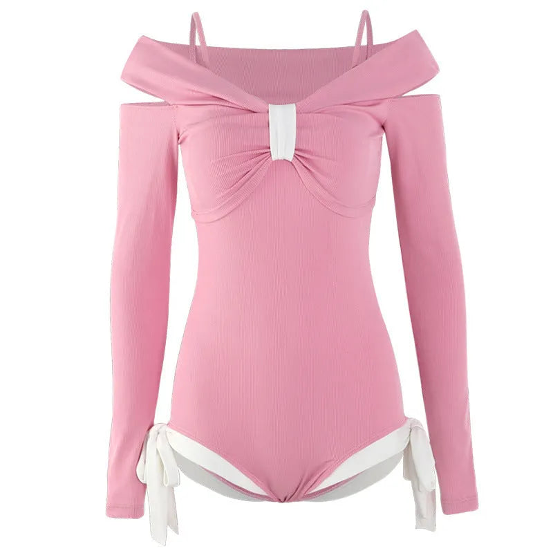 Women's long sleeve one-piece swimsuit in pink and black, showing front and back views.