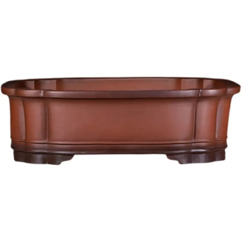 Large antique Chinese style purple clay flower pot with tree stump design and decorative botanical relief