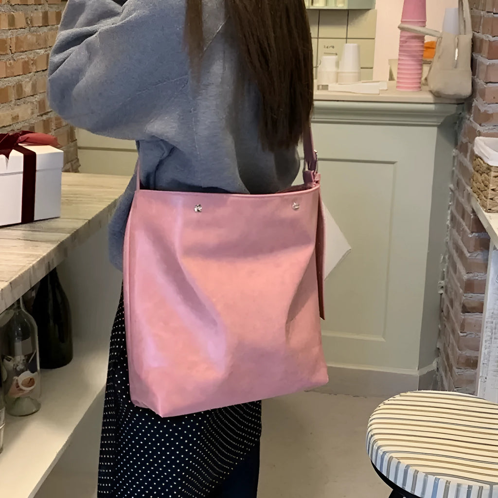 Pink corduroy one-shoulder bag with PU lining showing dimensions 39×32×11cm