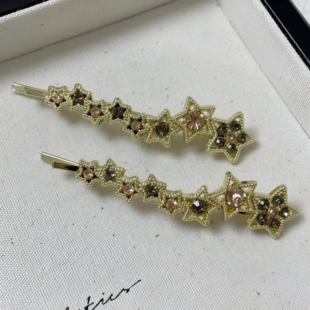 Gold colour alloy hair barrettes with broken clip design and five-pointed star decoration