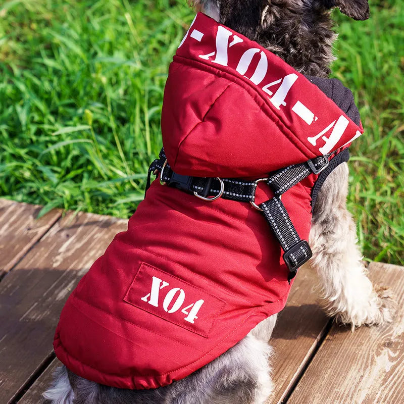 Red waterproof fleece-lined dog jacket with hood for winter wear on a small dog