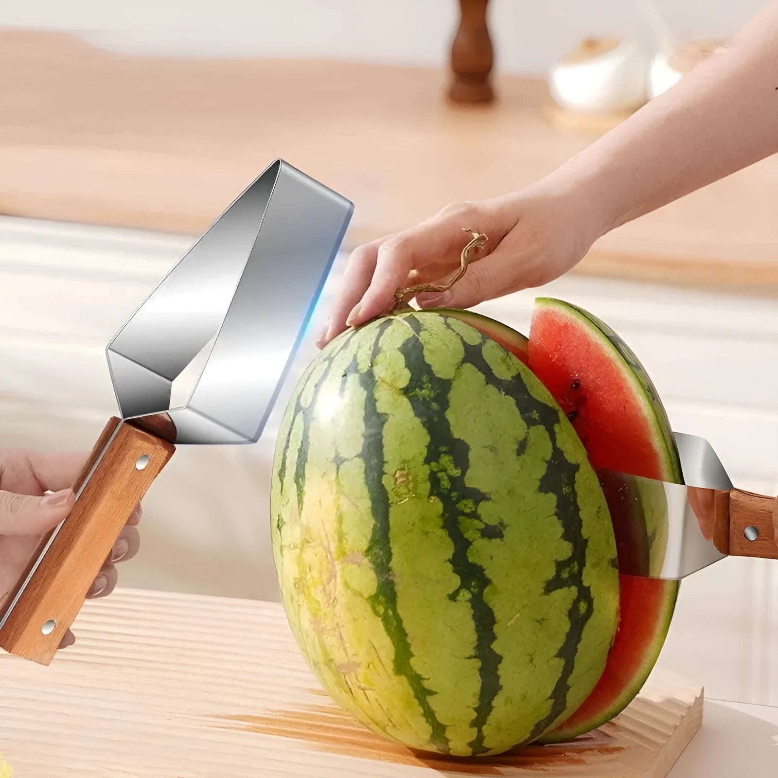 Natural colour 430 stainless steel triangle watermelon splitter with protective cover on a light background