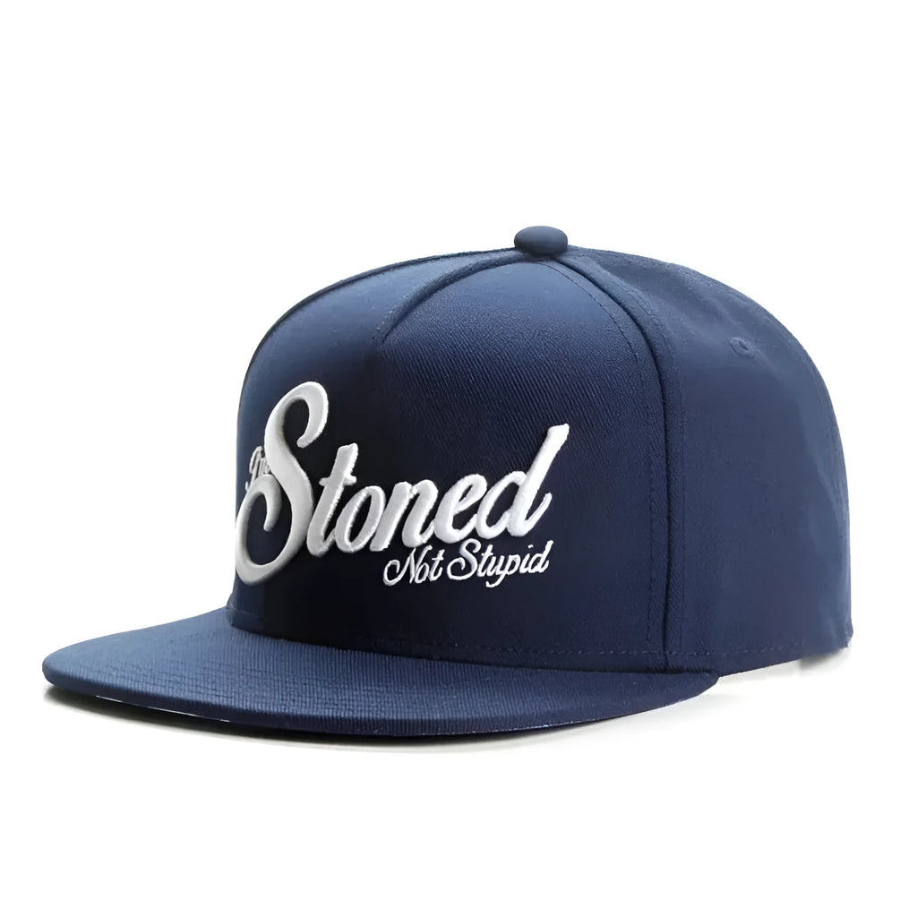 Navy blue cotton baseball cap with machine-embroidered English letters on front, dome crown, adjustable back strap