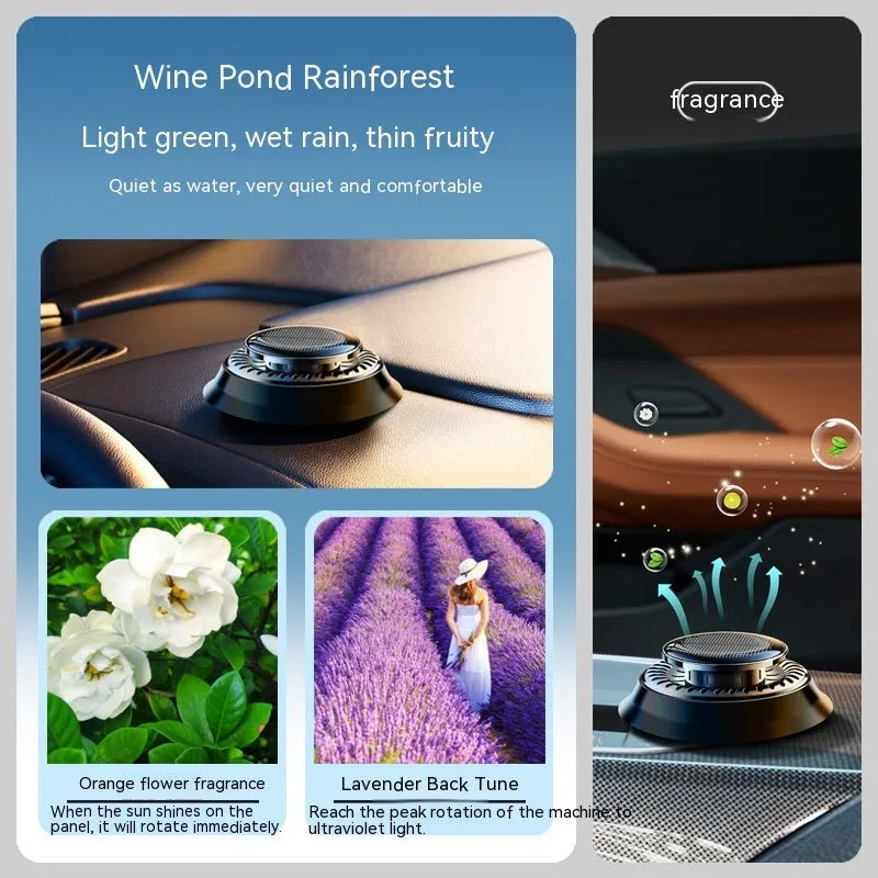 Solar-powered kinetic double ring rotating car air freshener fragrance diffuser on a car dashboard.