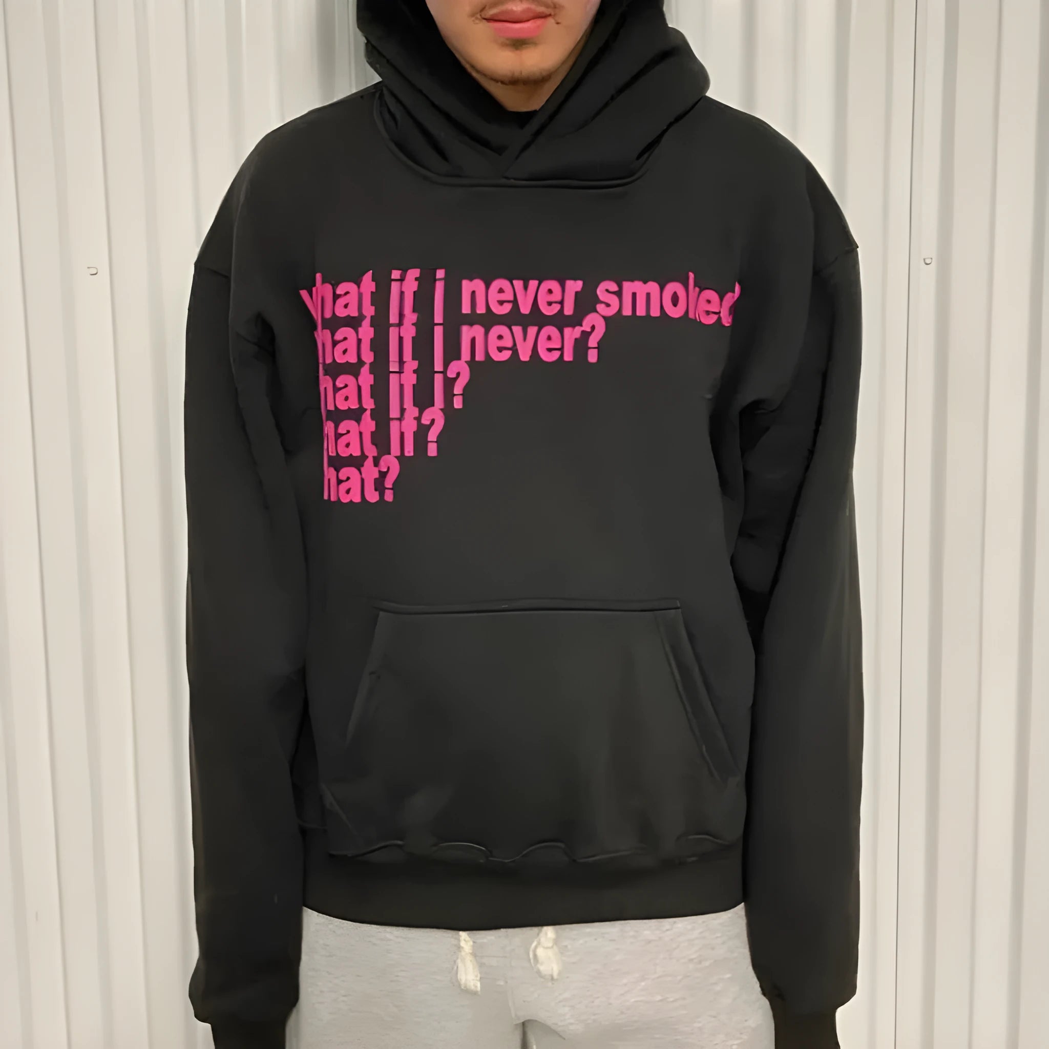Letter print heavy hooded sweater pullover in black, front view, with hooded collar and figure pattern