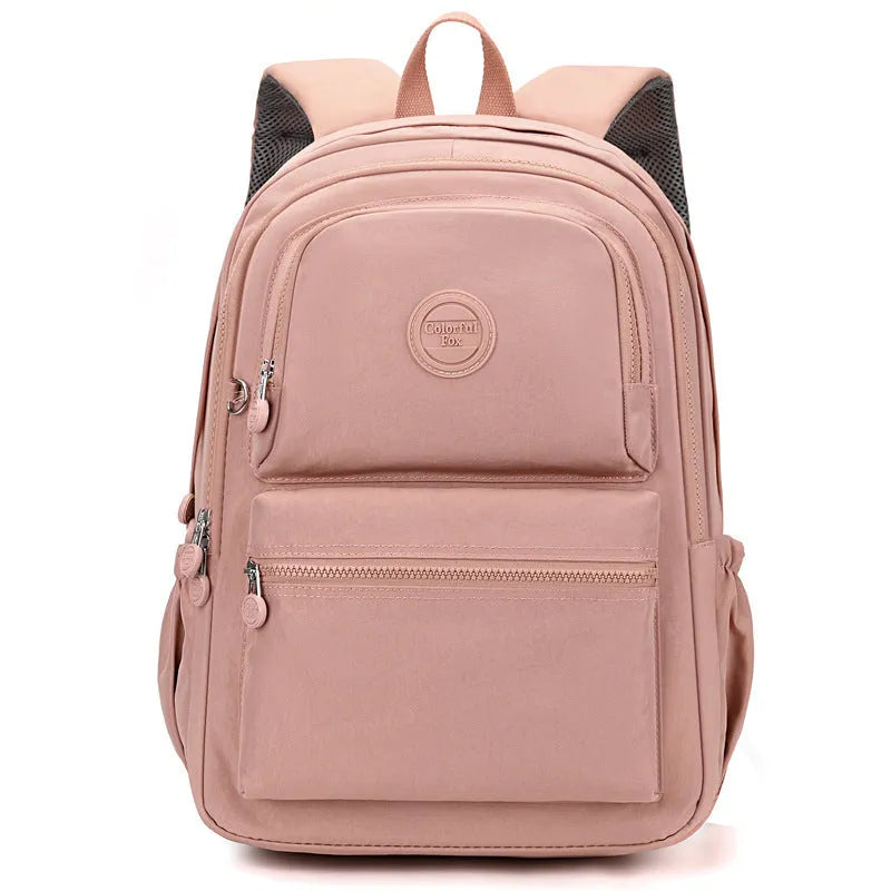Women's large capacity multi-layer nylon travel backpack in light blue purple with zippered compartments