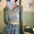 Dark blue oversized slim-fit women's viscose top with long princess sleeves and embroidery detail.
