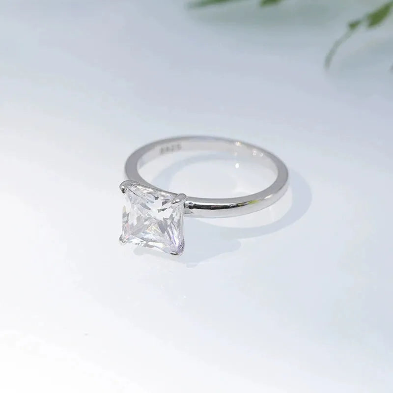 A simple geometric 925 silver women's ring in a choice of silver, gold, or rose gold finish.