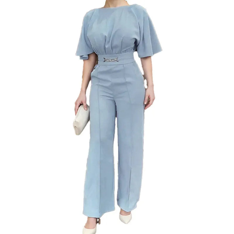 Blue polyester two-piece men's suit with long sleeves and trousers on a hanger