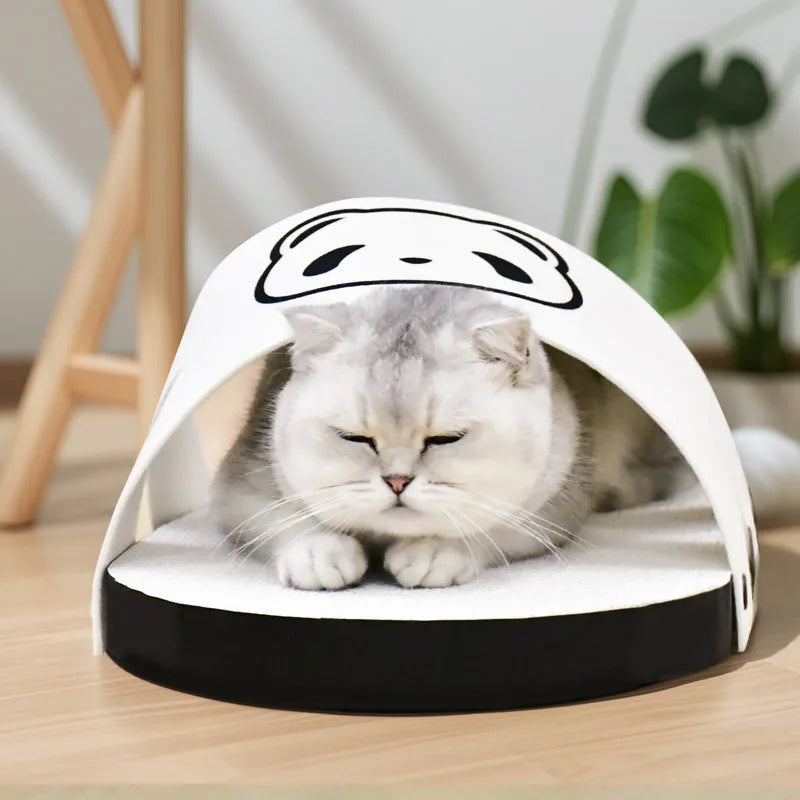 White corrugated cardboard cat scratch board shaped like a slipper on a plain background.