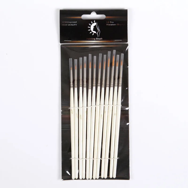 Set of 12 Pearl White handled artist paint brushes with nylon wool heads, sizes 000 to 4/0.