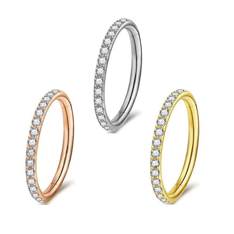 Stainless steel seamless nose ring with diamond front design in gold finish