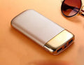Portable 20000mAh LCD display power bank with dual USB ports and LED light in black