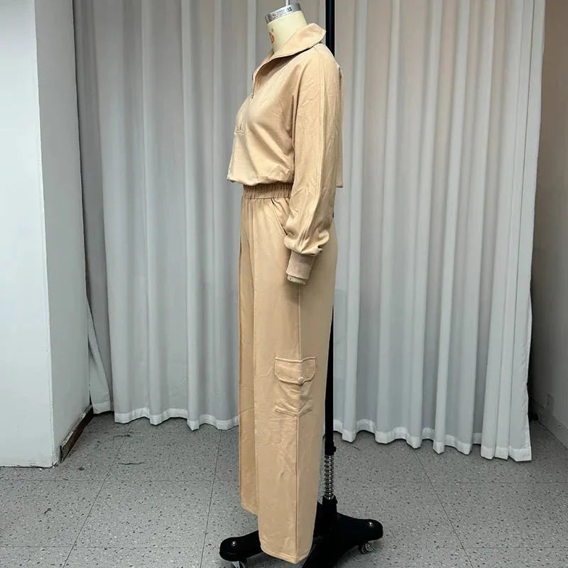 Women in light camel lapel short top and high-waist wide leg trousers two-piece set with long sleeves