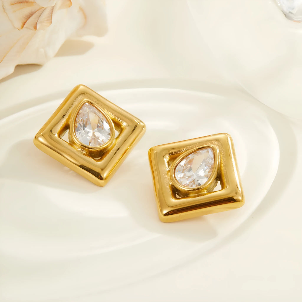 Gold-coloured geometric stud earrings with inlaid water drop zircon stones