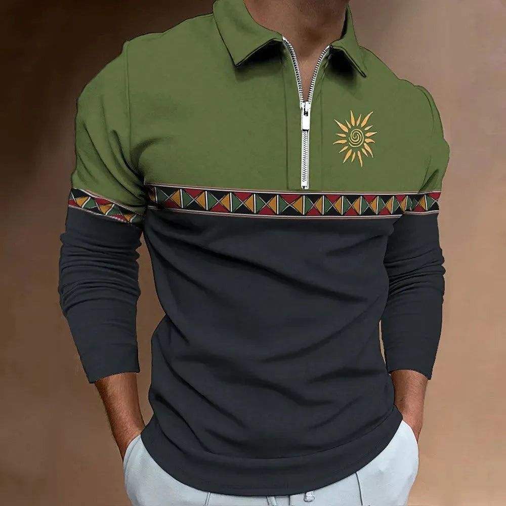 Man wearing a loose-fit long sleeve t-shirt with retro colour block printing and a decorative zipper detail.