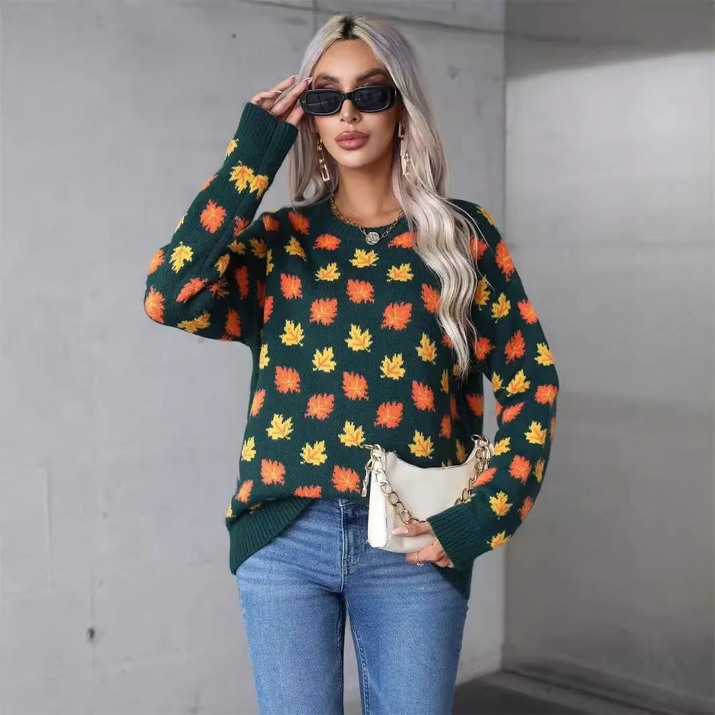 Women's beige loose fit polyester sweater with maple leaf contrast colour pattern and round neck