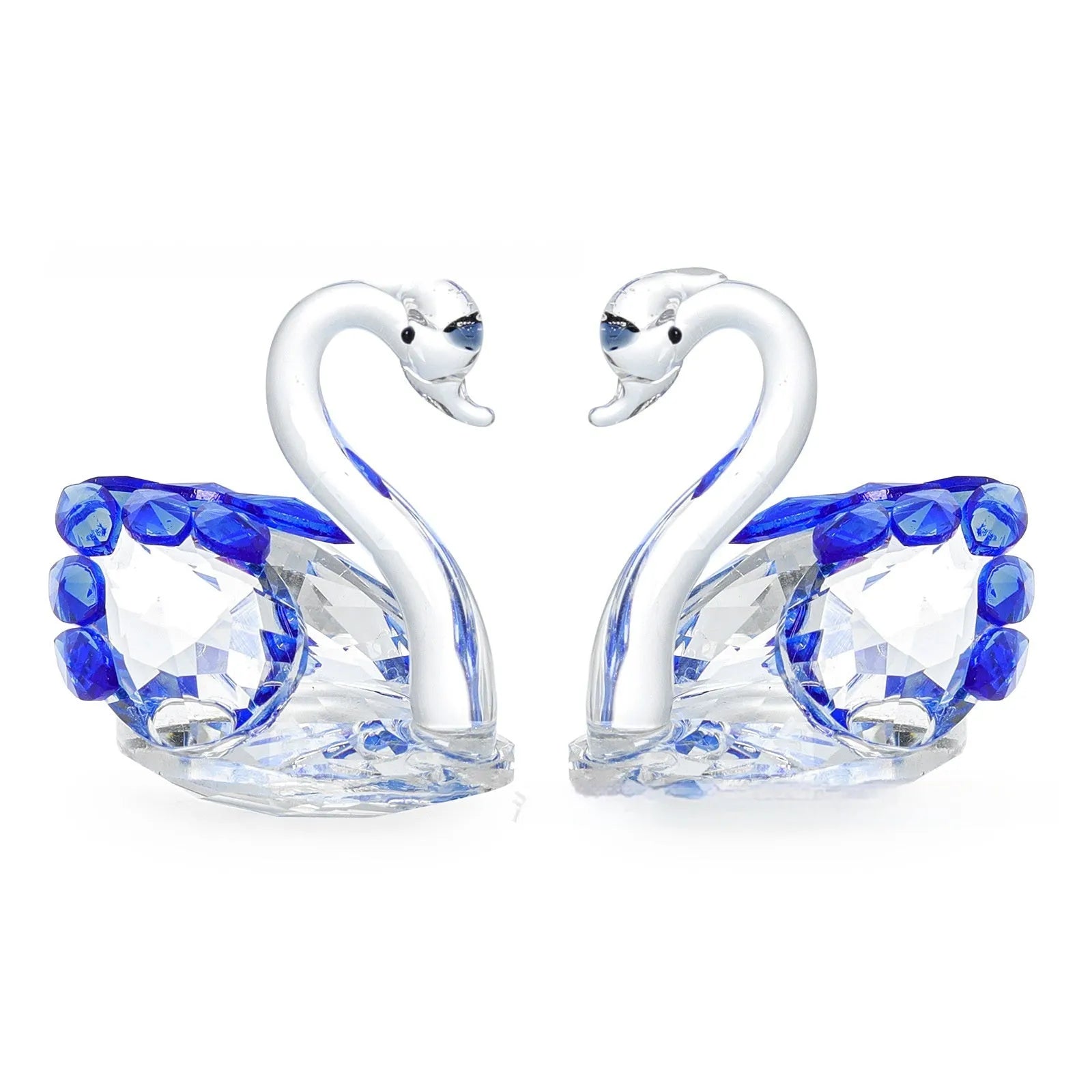White crystal swan ornament in red, blue, pink, or purple on wooden desk