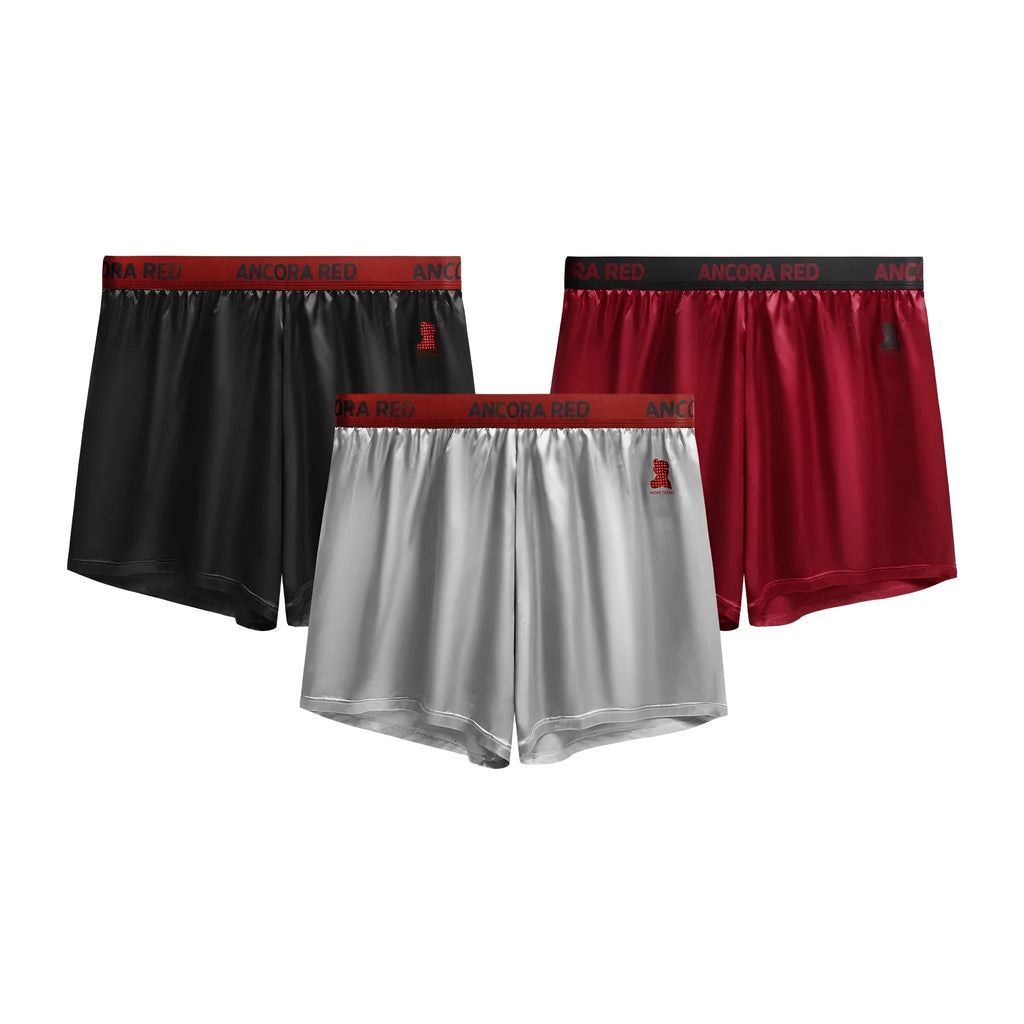 Solid colour men's boxer briefs in polyester fabric on a mid waist mannequin.
