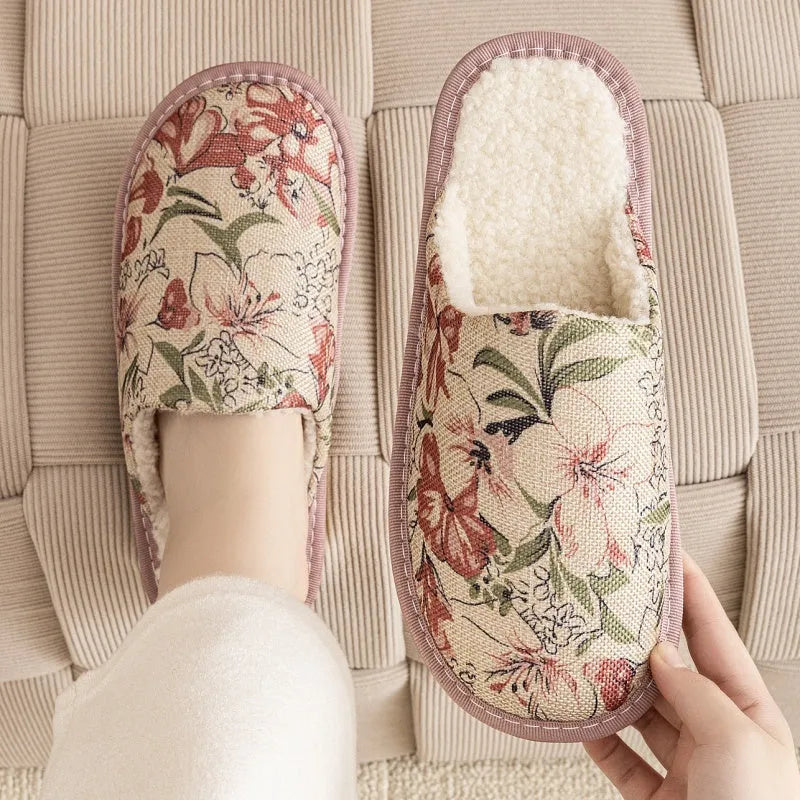 Warm winter linen surface cotton slippers with PVC sole, red flower colour, size 27cm on a wooden floor