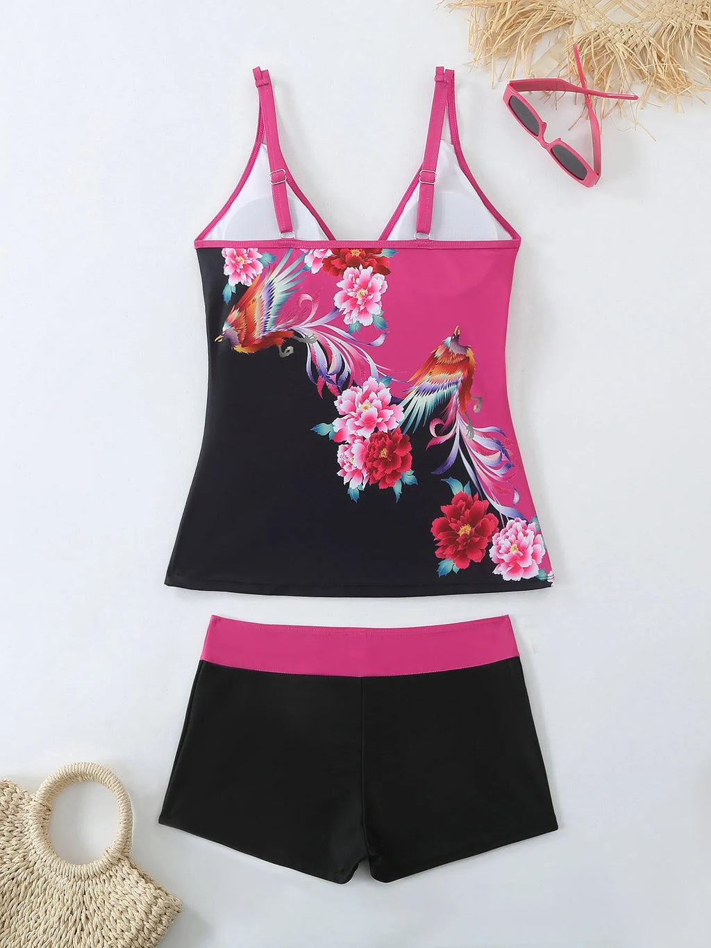 Plus size women's printed two-piece swimsuit in black or rose red with briefs style bottom.