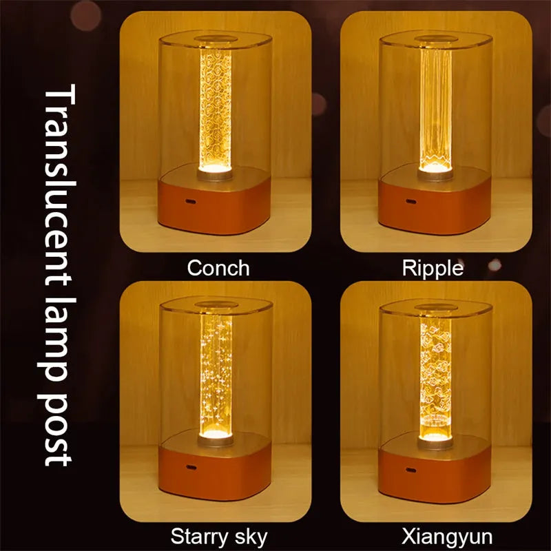 Rose gold LED touch atmosphere light with Auspicious Cloud pattern on a bedside table, USB charging cable included