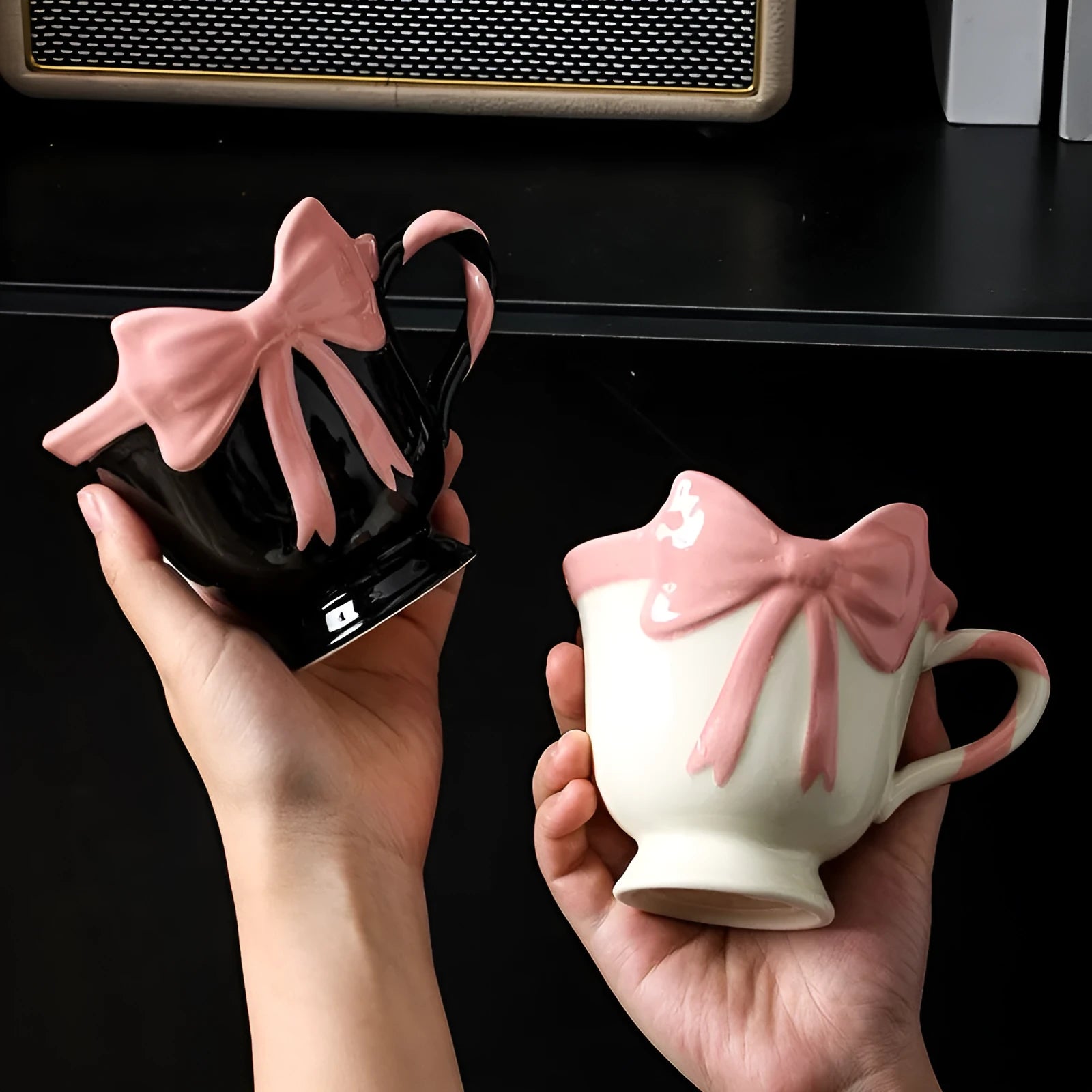 Ceramic mug with heart bow design in white powder or black pink colours, 301-400ml capacity