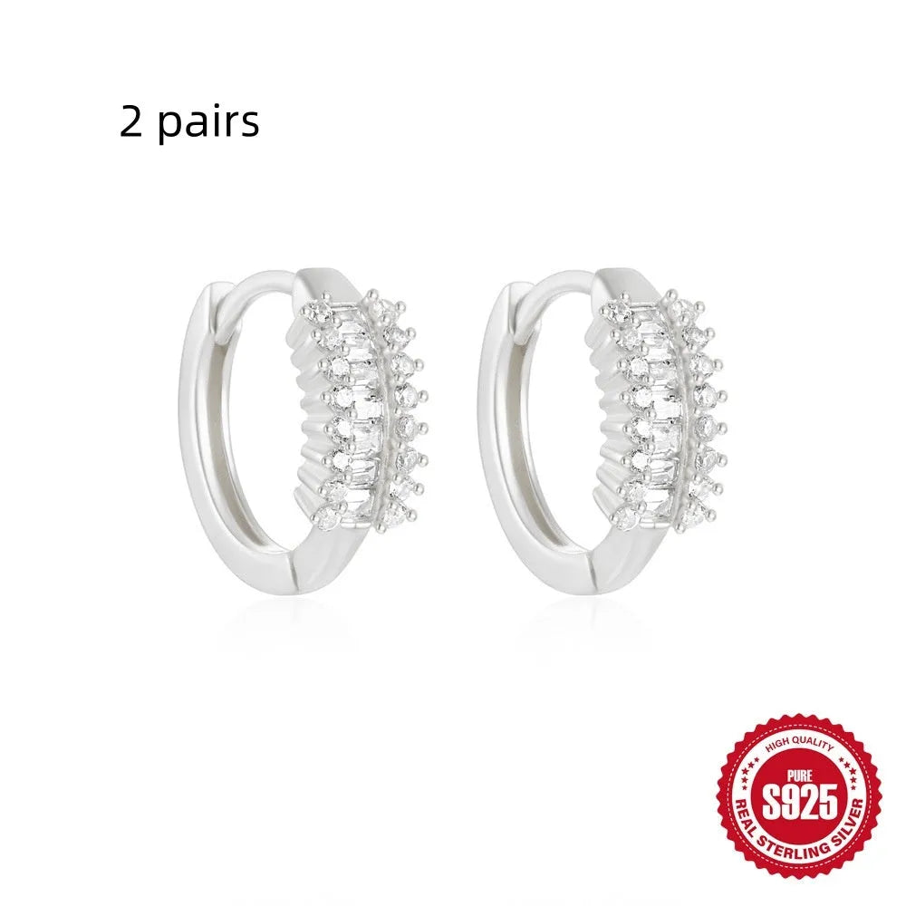 Sterling silver geometric stud earrings with small round circle design in gold or silver tone