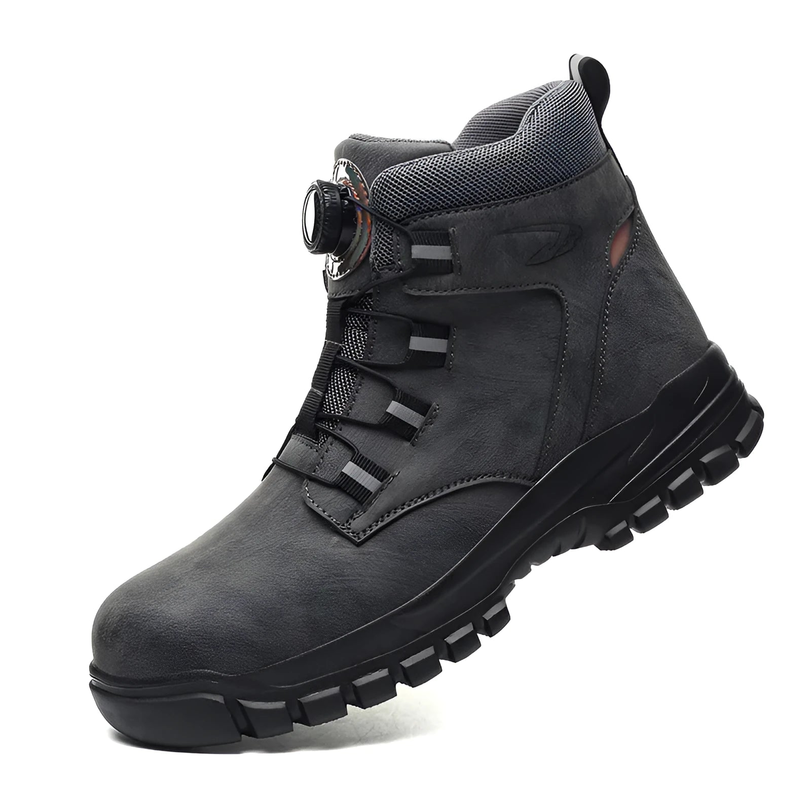 Pair of lightweight black leather labour protection safety shoes with rubber soles on a grey background.