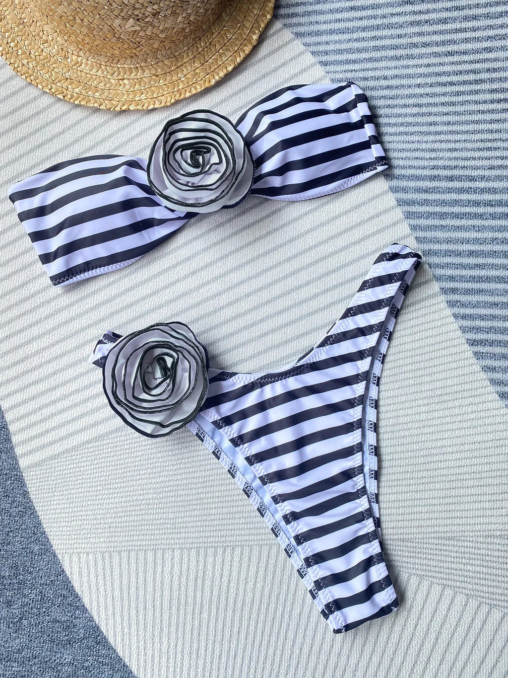 Bikini swimsuit set with tube top and shorts featuring three-dimensional flower split design