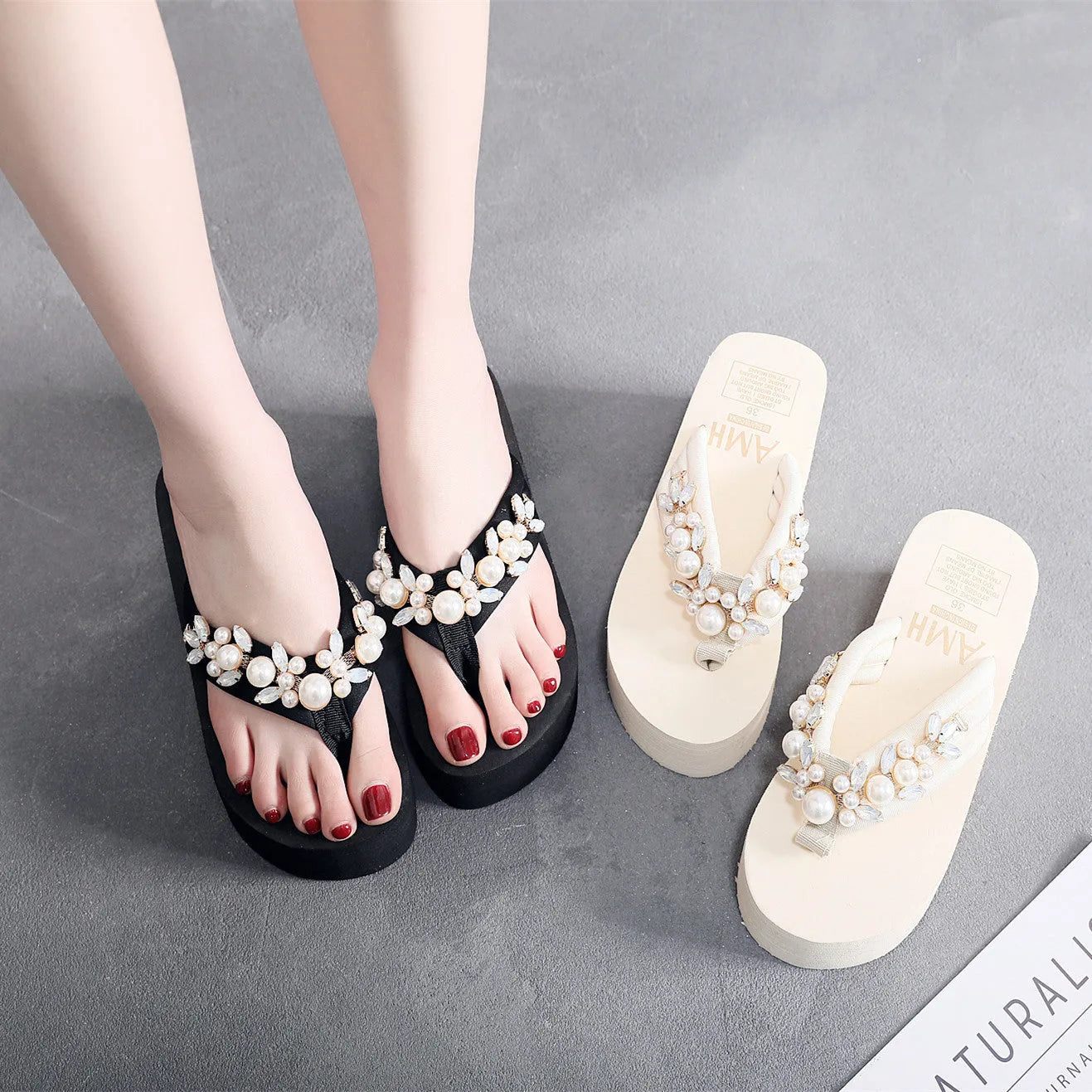 Women's beige high-heeled flip-flops with a cotton cloth upper, shown from the side.