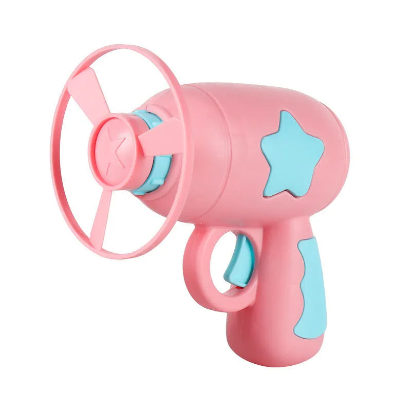 Flying saucer launcher toy with three blue flashing LED discs and target board on blister card