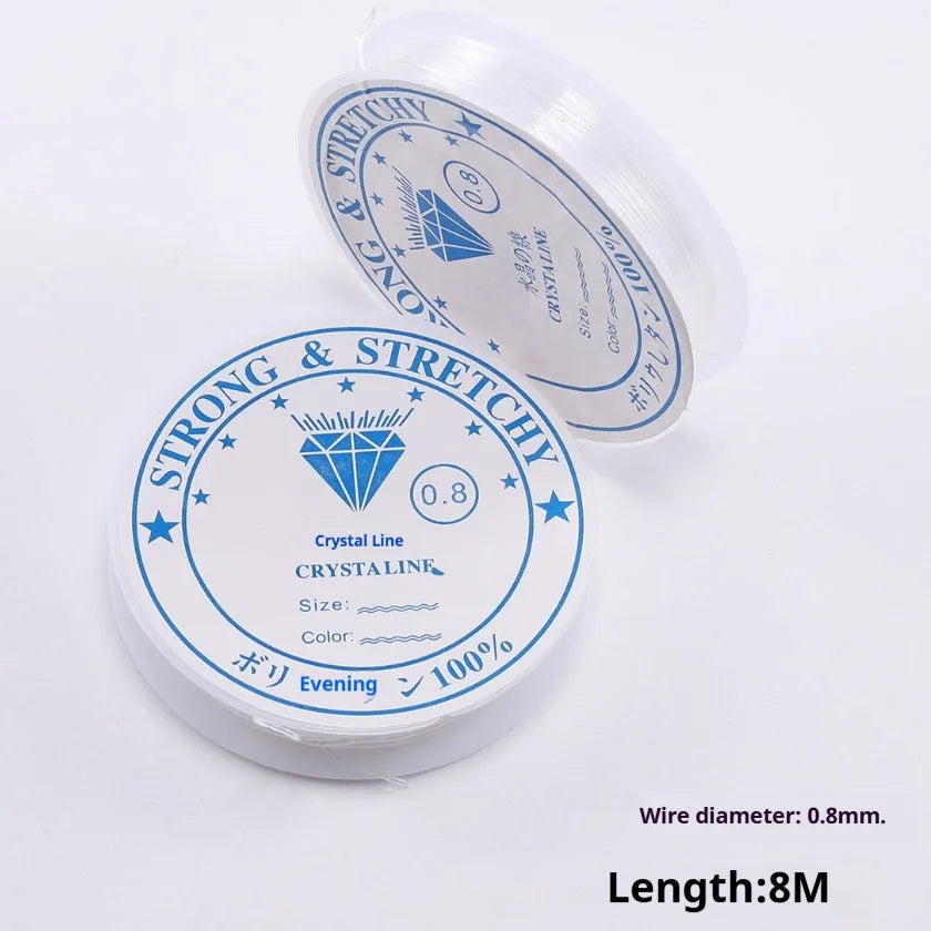 Reel of transparent white elastic fishing line for DIY jewellery and craft beading.