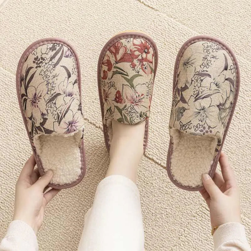 Warm winter linen surface cotton slippers with PVC sole, red flower colour, size 27cm on a wooden floor